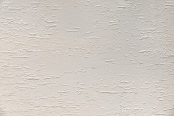 Wall painted with white paint with horizontal elongated drop effect