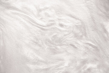 Shimmering silver abstract background. Liquid glitter paint texture waves and swirls. Beautiful...