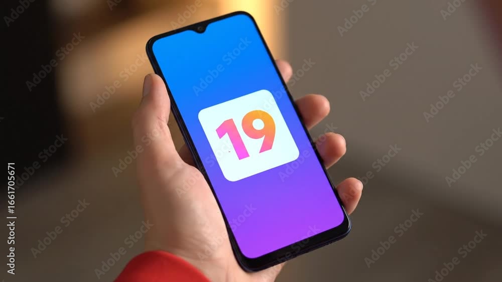 Poster hand holding black smartphone with gradient display and number square interface