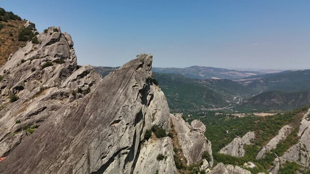 Aerial view of Castelmezzano rock formations and medieval ruins, Basilicata, Italy