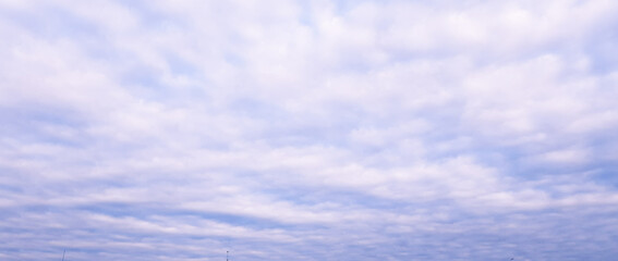 sky background with clouds in purple tones. place for creative text, advertising. Copy space 