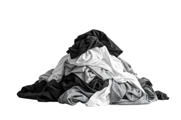 Mountain of crumpled mixed colored clothing including black white and gray garments piled high, isolated on a transparent background