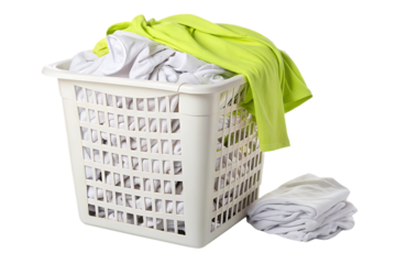 White laundry basket with bright lime green shirt draped over edge and white clothes, isolated on a transparent background