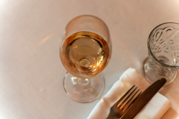 Glass of White Wine on Elegant Table. Restaurant Atmosphere