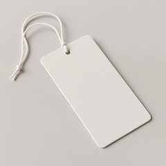 Minimalist Clothing Hang Tag Mockup with White String on Gray Background