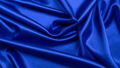 Obraz premium Luxurious Deep Blue Satin Fabric with Elegant Drapes and Soft Folds