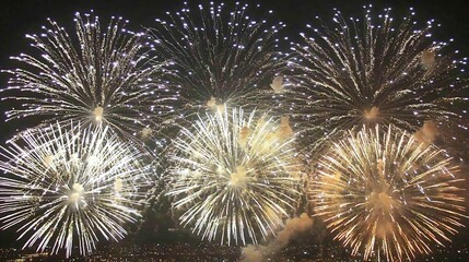 DSLR 24-70mm lens wide shot, large fireworks filling frame with city silhouette faintly visible below, night atmosphere naturally lit by bursts