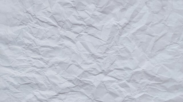 Crumpled paper texture animated background. Ideal for overlays and blend modes.