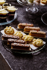 A plate of assorted gourmet tarts and pastries on a dessert buffet