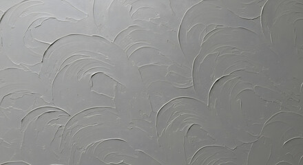 Abstract monochromatic stucco wall features flowing, curved patterns creating a visually tactile surface with a sense of movement and depth. The texture is highlighted by subtle gradients in shading