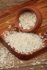Organic basmathi rice spilled out of clay pot ,Close up
