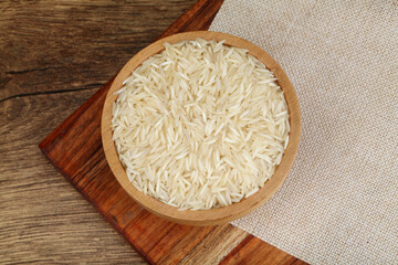 Bowl of raw organic basmati rice ,Close up