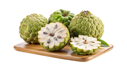 Fototapeta premium Studio shot of a group of fresh custard apples on wooden board