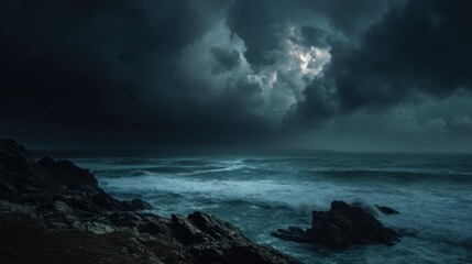 Obraz premium Dark Clouds Over Raging Sea at Night Captured in Dramatic Scene