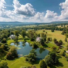 Panoramic view of countryside estate with manor, rolling hills, ponds, and gardens