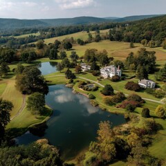 Panoramic view of countryside estate with manor, rolling hills, ponds, and gardens