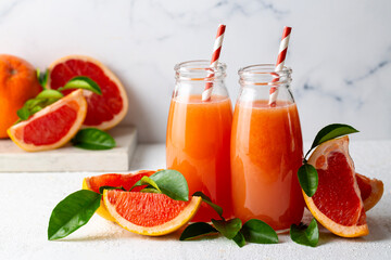 Tasty freshly made grapefruit juice and fruit