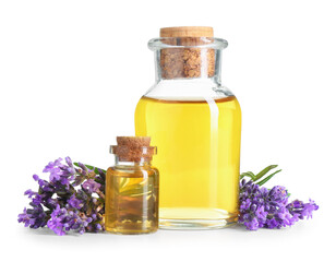 Lavender essential oil in bottles and flowers isolated on white