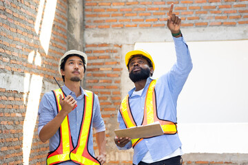 Engineering people, construction site. construction worker planning and architecture in construction site. Caucasian men