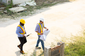 Engineering people, construction site. construction worker planning and architecture in construction site. Caucasian men