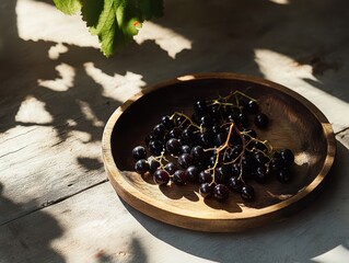 Blueberries are laid on the wooden plate.