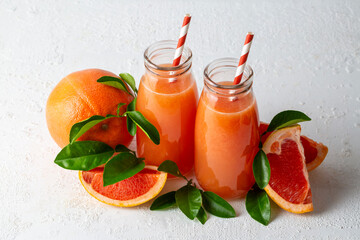 Tasty freshly made grapefruit juice and fruit