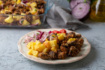 Liver pan (Albanian liver) Turkish traditional food. Liver over rice. (Turkish name; arnavut ciger)