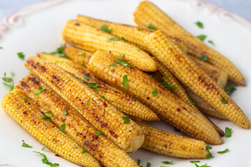 Fried  or grilled corn with various spices