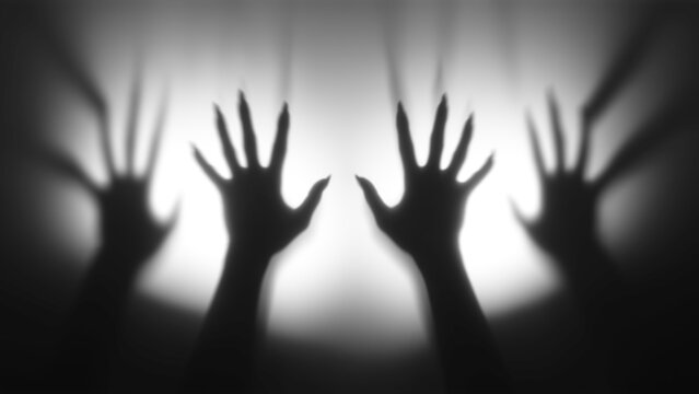 Shadow overlay effect for halloween background with Terrifying scary hands with long nails,Creepy monster claw,silhouette of hands,zombie hand rising out of a graveyard,silhouette of hands