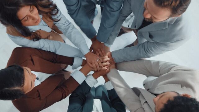 Business people, hands together or meeting with applause above for team success or unity in office. Group, employees or clapping in huddle with pile or stack for collaboration, mission or achievement