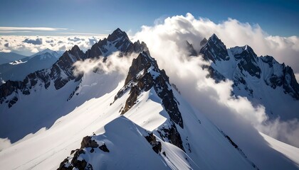 Snowy Mountain Peaks with Clouds Aerial View