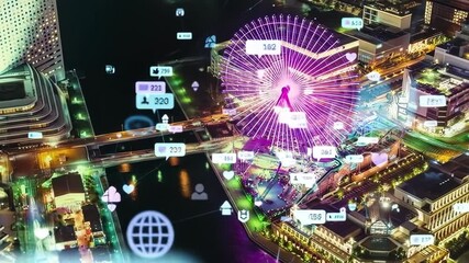 Aerial view of a city at night, overlaid with glowing social media icons and a Ferris wheel - Powered by Adobe