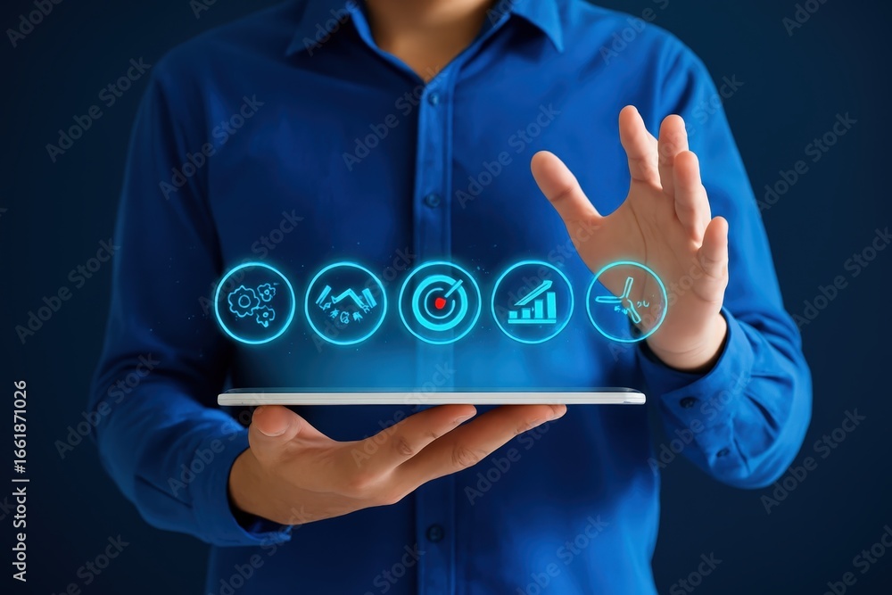 Poster a person holds a tablet displaying a collection of glowing, digital icons representing various busin