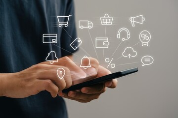 A person interacts with a smartphone displaying a network of digital commerce icons, showcasing a modern mobile shopping experience.