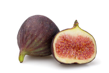 Fig fruits - whole and half, isolated on white background.
