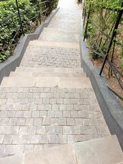 Ancient stone staircase on a street in Italy
