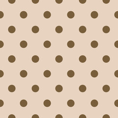 Light cream background with rich brown dots in a seamless polka dot pattern. Perfect for home decor, wrapping, and textile design. © lara