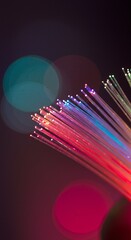 Abstract macro shot of vibrant, glowing fiber optics with colorful bokeh lights in a dreamy, ethereal, and magical atmosphere, symbolizing connection and data transmission