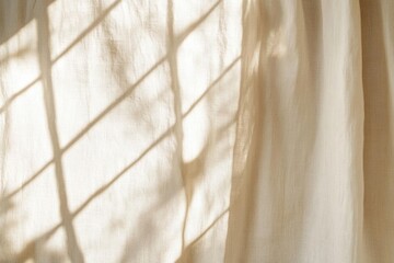 Sunlight on Beige Fabric Creates Window Shadows with Simplicity Theme