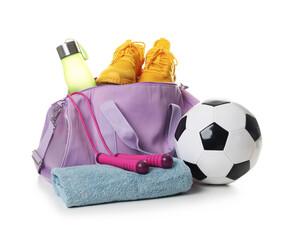 Stylish gym bag with sports equipment, sneakers, bottle and towel isolated on white