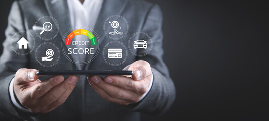 Credit score concept, Person use smartphone with virtual credit score icon for chart with credit...