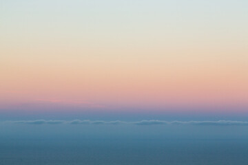 Pinkish and yellowish sunset at Caspian Sea in Derbent, Dagestan, Russia