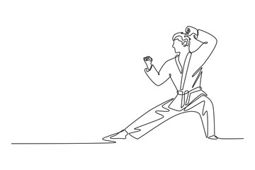 Single one line drawing male karate athlete in strong defensive low stance. Symbolizing power, discipline, self-defense aspect of martial arts. Continuous line draw design graphic vector illustration
