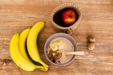 Fresh Granola with Mixed Fruits and Nuts on Table