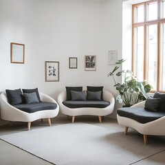 An interior design of a Scandinavian home featuring curved loveseat sofas against a white wall with frames. Living room design of a modern Scandinavian home...