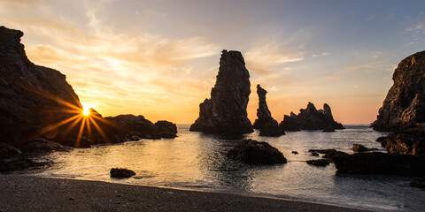 Belle ile morbihan Golden Sunset Silhouette of Rock Formation at Sea © Pix