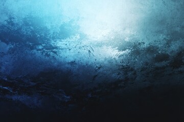 Underwater view showcasing blue hues and light reflections in a tranquil ocean setting