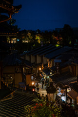 Ninenzaka Street in Kyoto at night, with lanterns lighting the traditional wooden houses and quiet lanes, capturing the charm, history, and timeless beauty of Japan’s ancient streets.