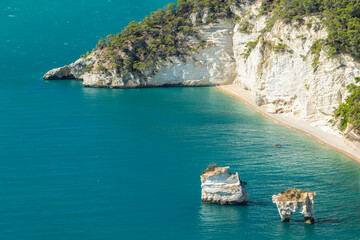 White Cliffs and Turquoise Sea Meeting at Baia delle Zagare in Mattinata, Italy