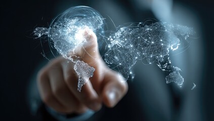 A hand points at a glowing, digital world map, illustrating global connectivity and networking, emphasizing technological reach and influence